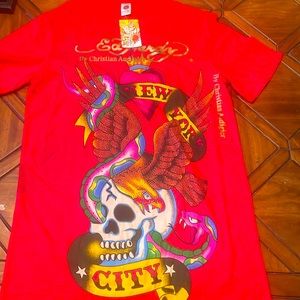 New with tags Christian Audigier t shirt XXL fits like a Large.